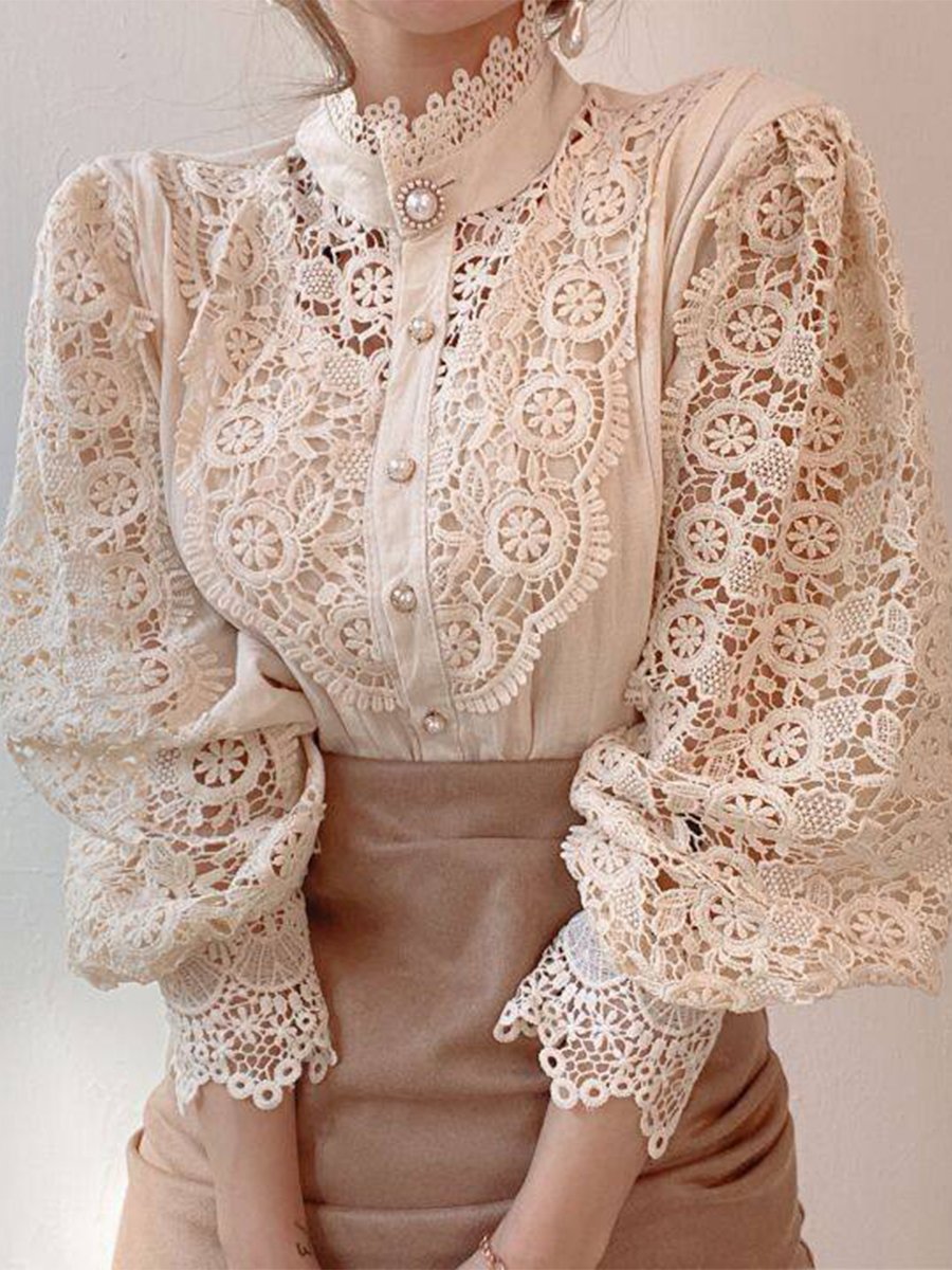 Vintage-Inspired Lace Blouse with Pearl Button Details
