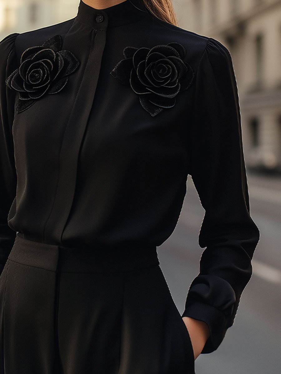 Sleek Black Blouse with Dimensional Rose Accents